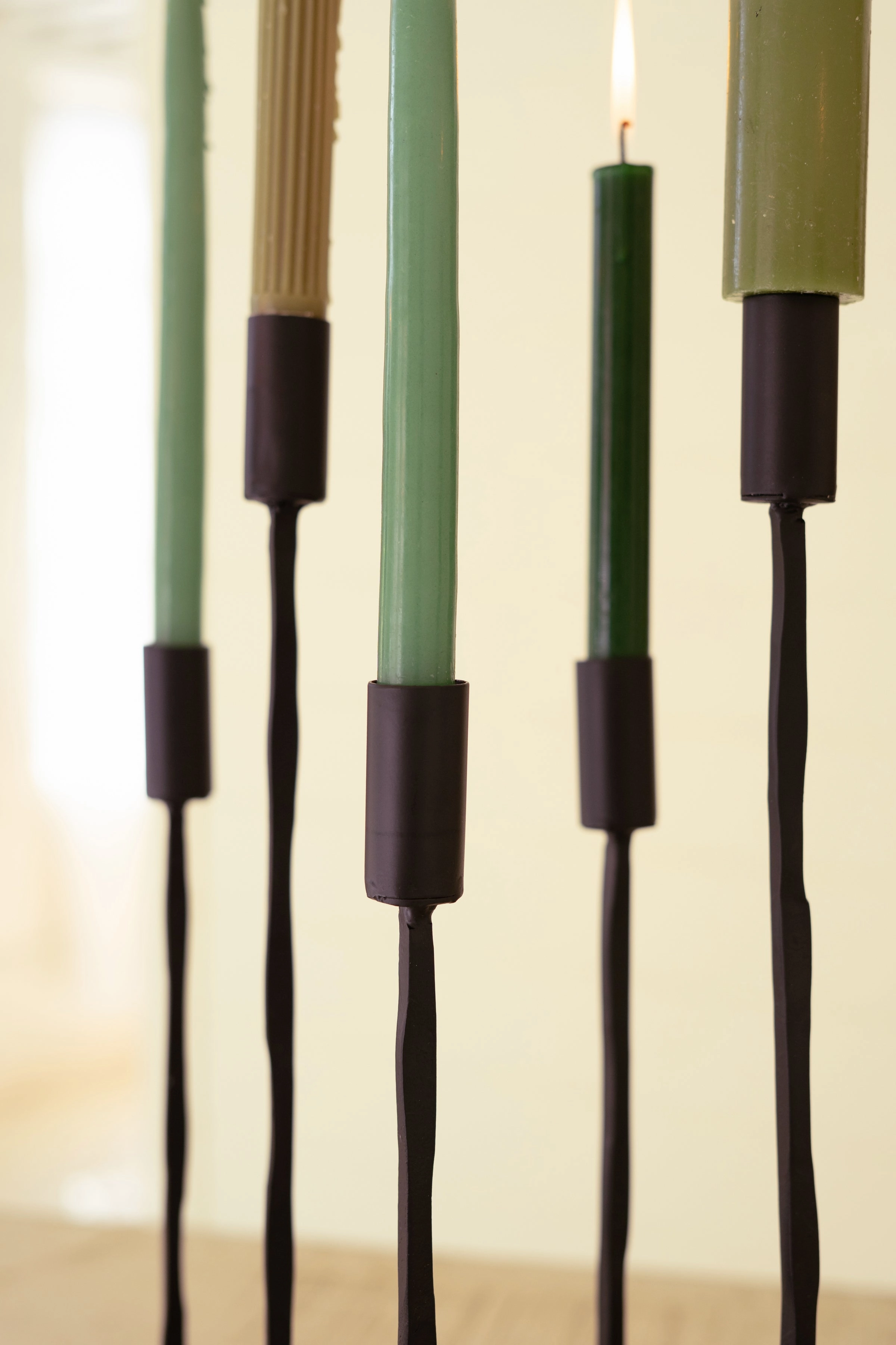 Eleven Forged Iron Taper Candelabra