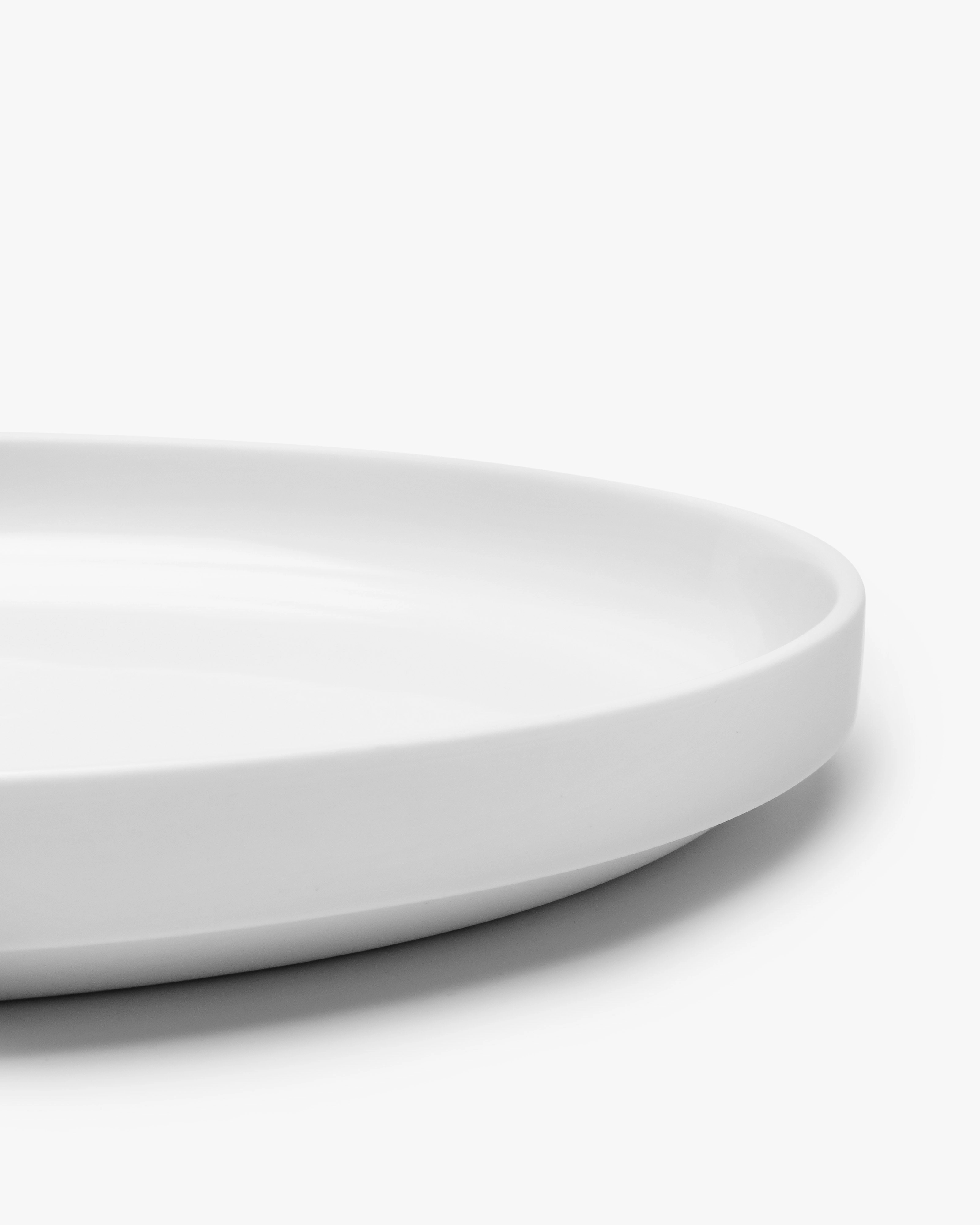 Low dinner plate white matt Passe-partout