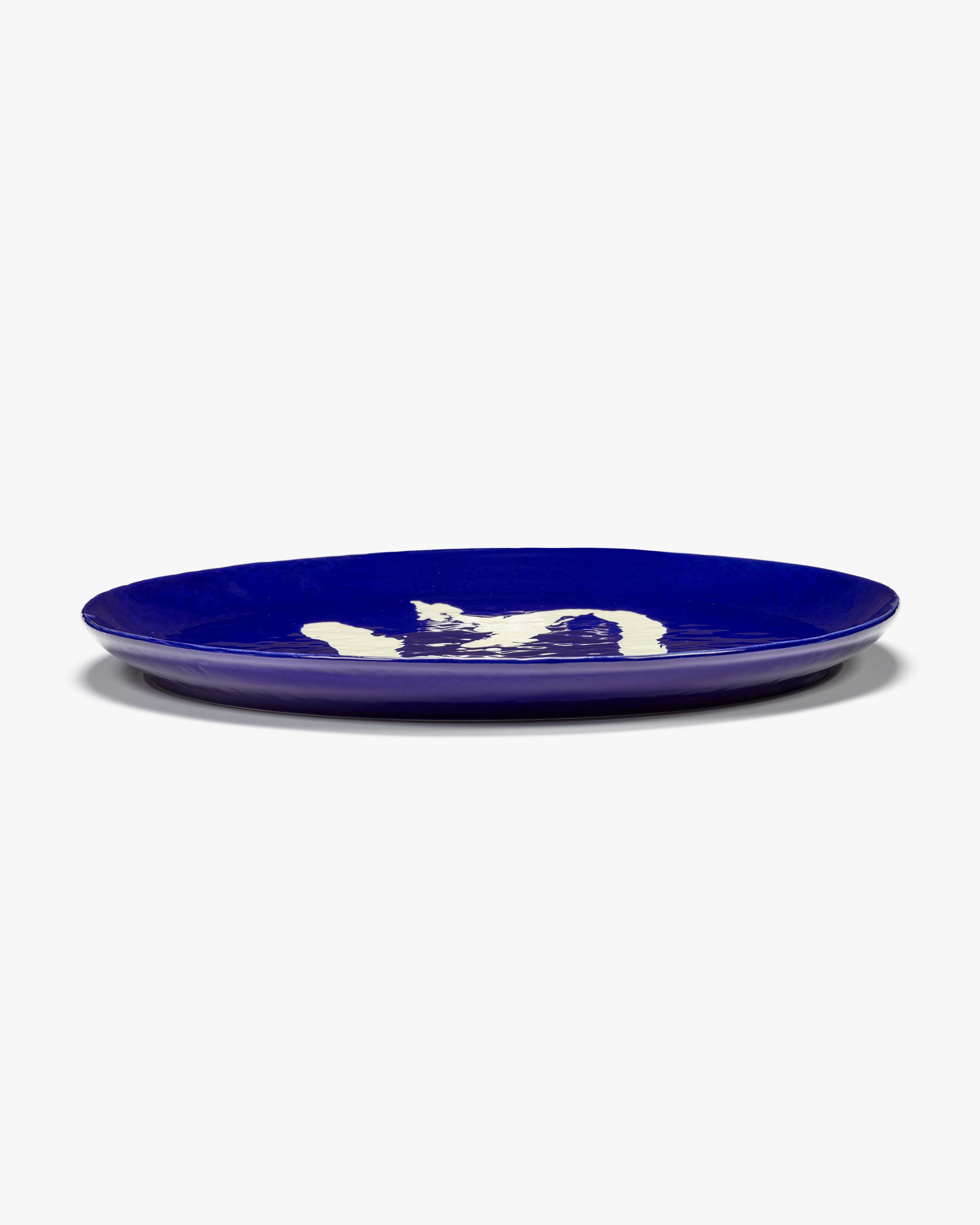 Serving plate L blue - white pepper Feast