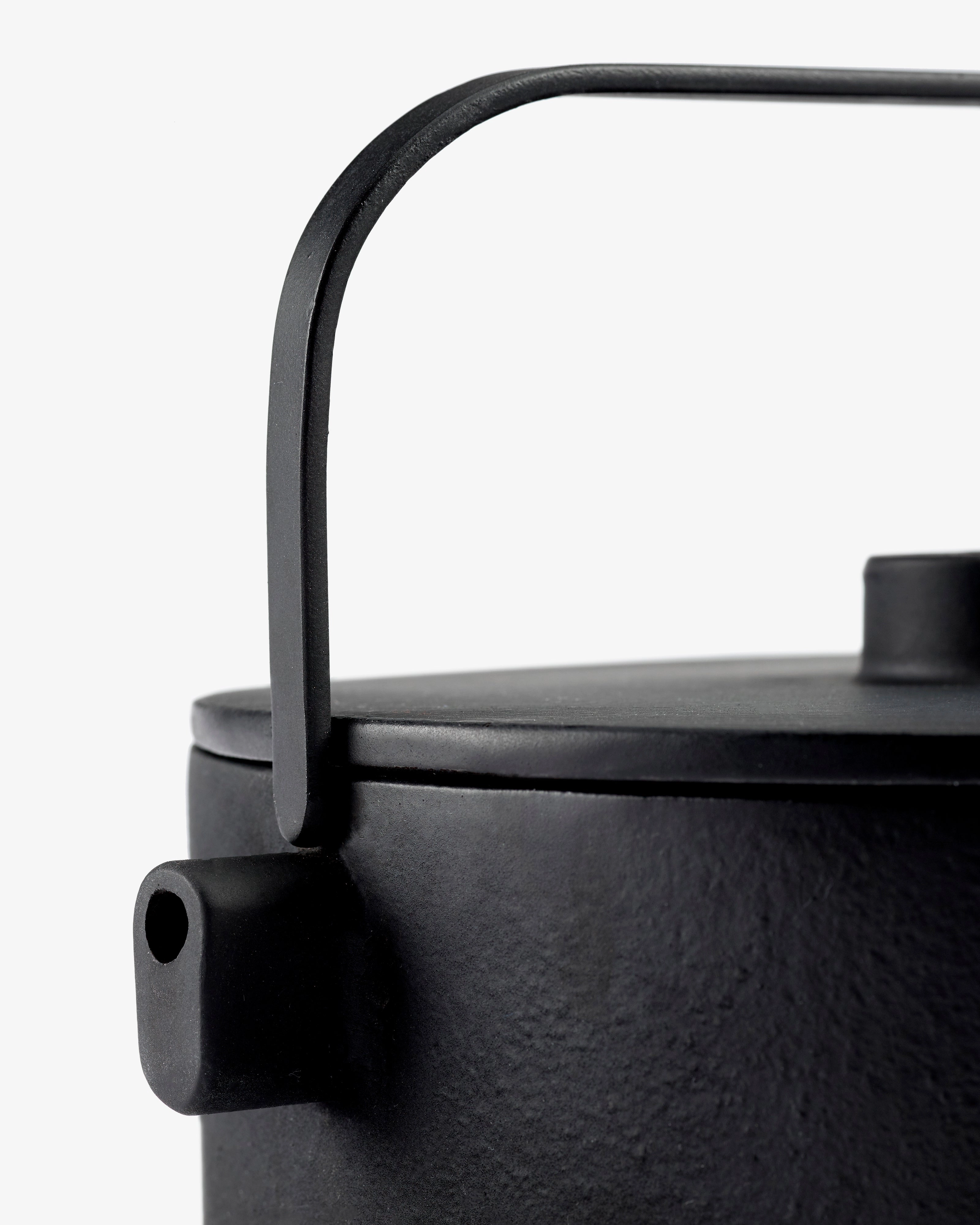 Tea pot cast iron black Collage