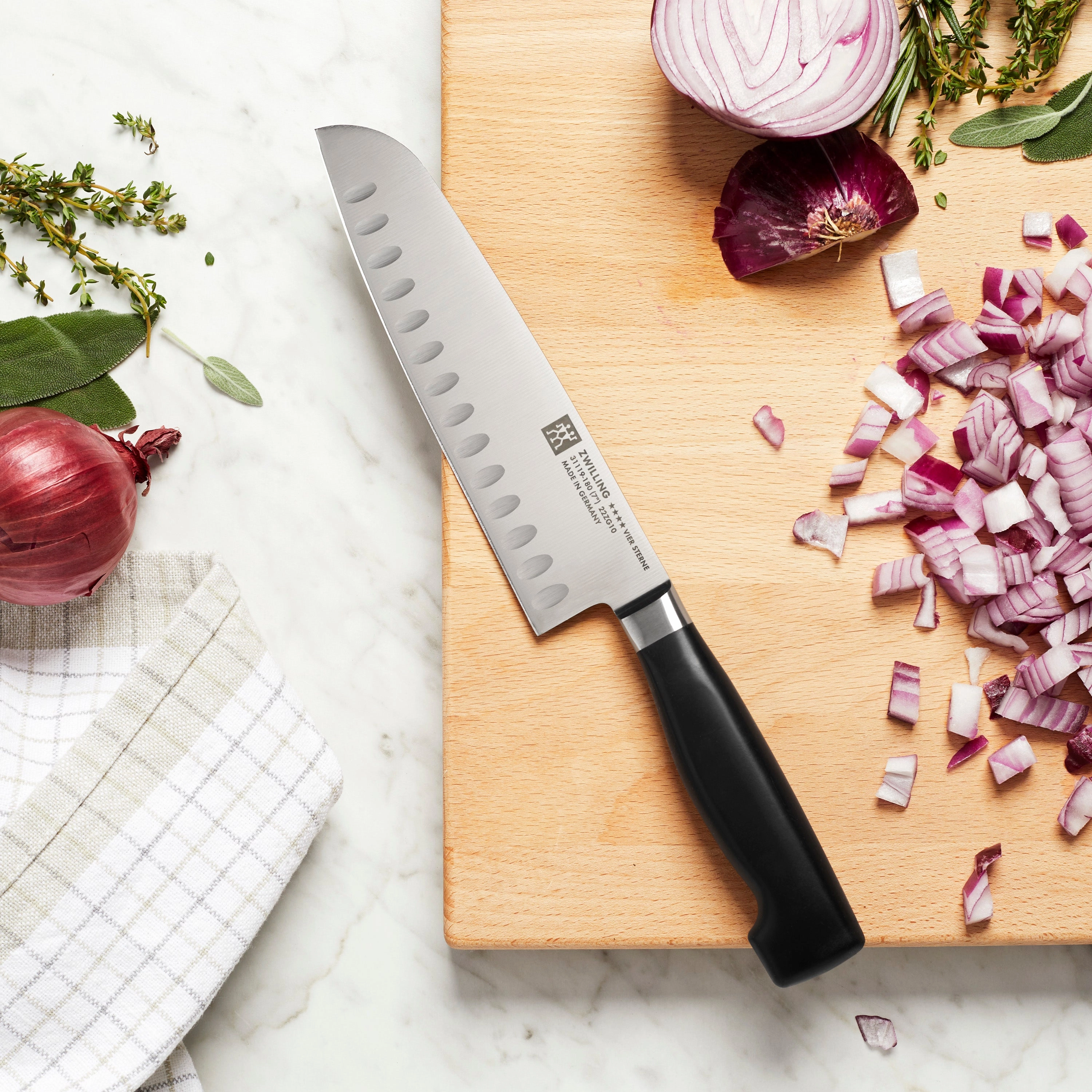 ZWILLING Four Star Hollow Edge Santoku Knife